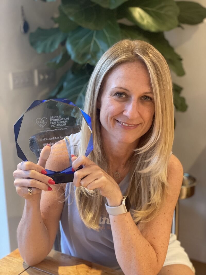 Annabel Wharton, Head of Inclusion, with her award