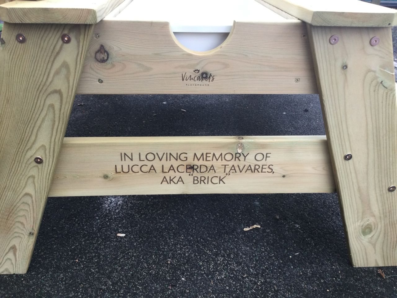 The engraving on the Sensory Bench: In loving memory of Lucca Lacerda Tavares, aka Brick