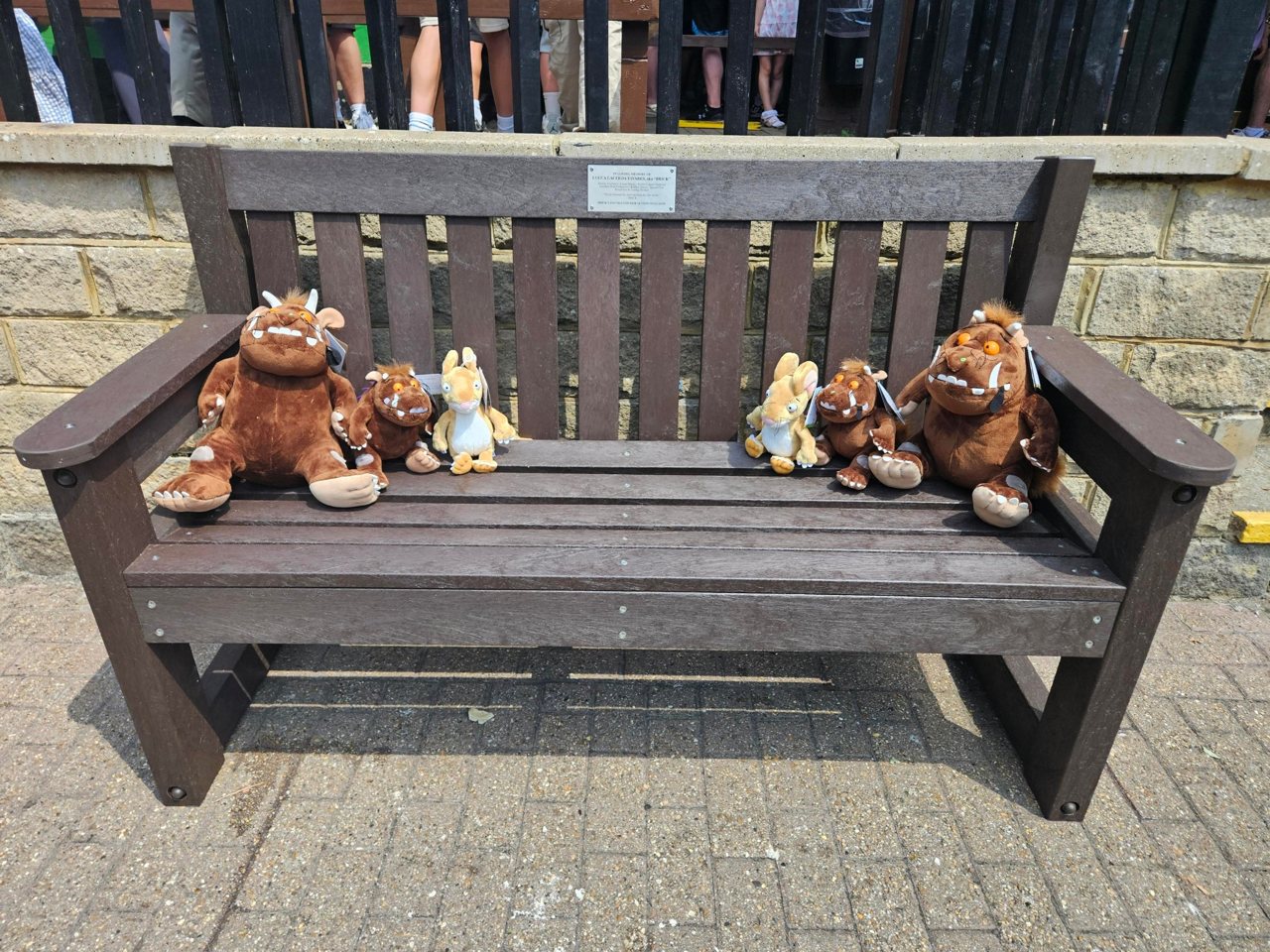 Lucca's bench at Chessington with six Gruffalo soft toys sitting on it