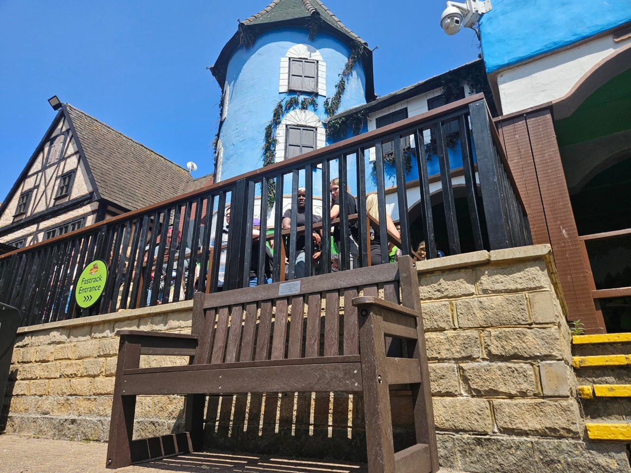 Lucca's bench in front of the Gruffalo ride, with its blue tower behind